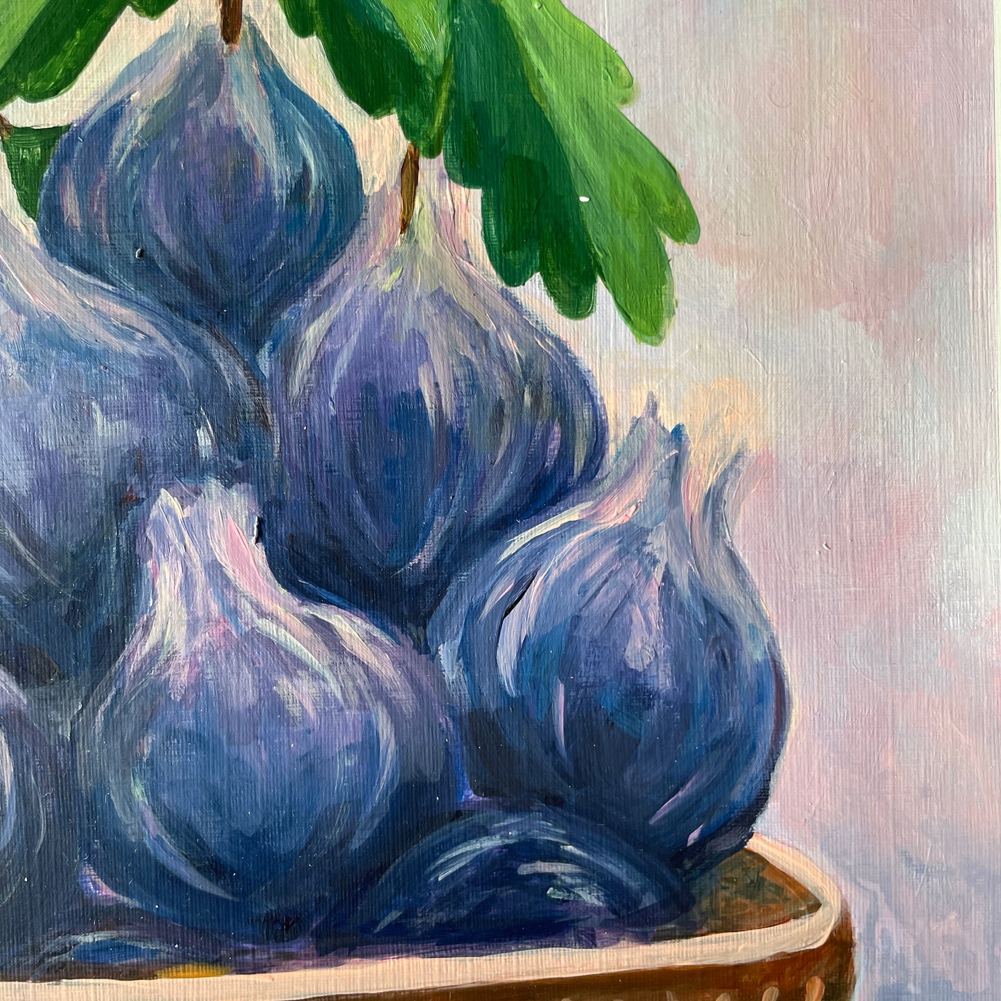 Painting of blue figs with green leaves on a textured surface