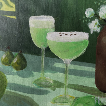 Painting of two green cocktails with a white foam top on. a dark background
