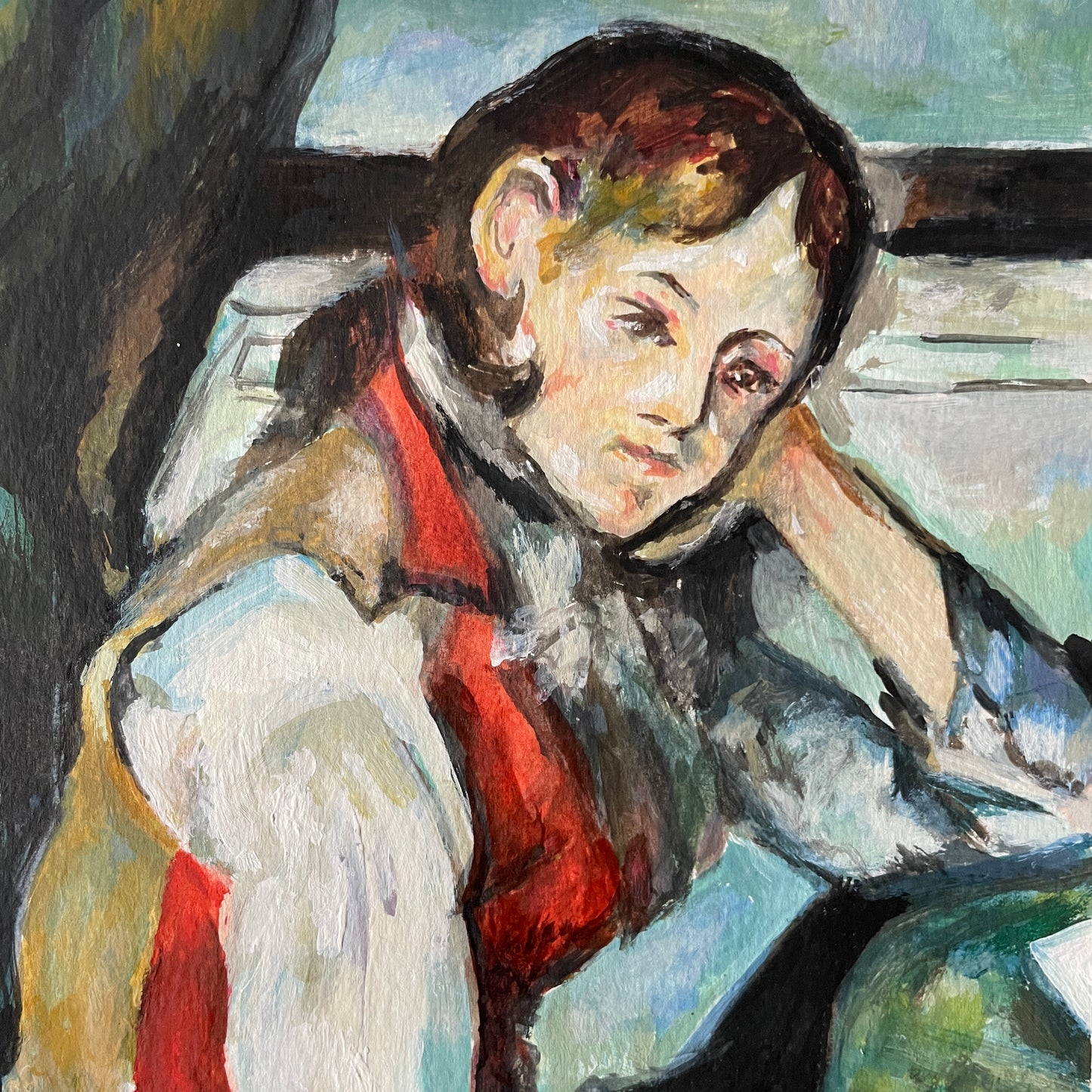 close up of boy in red waistcoat