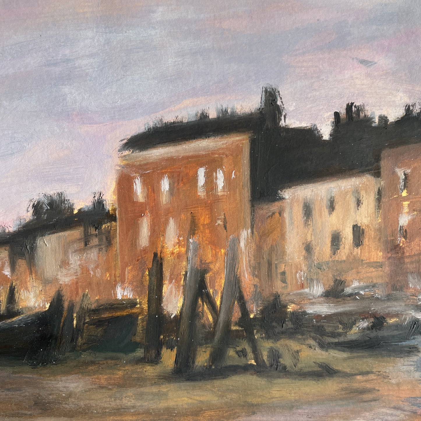 Painting of a street scene with buildings and boats, coastal setting.