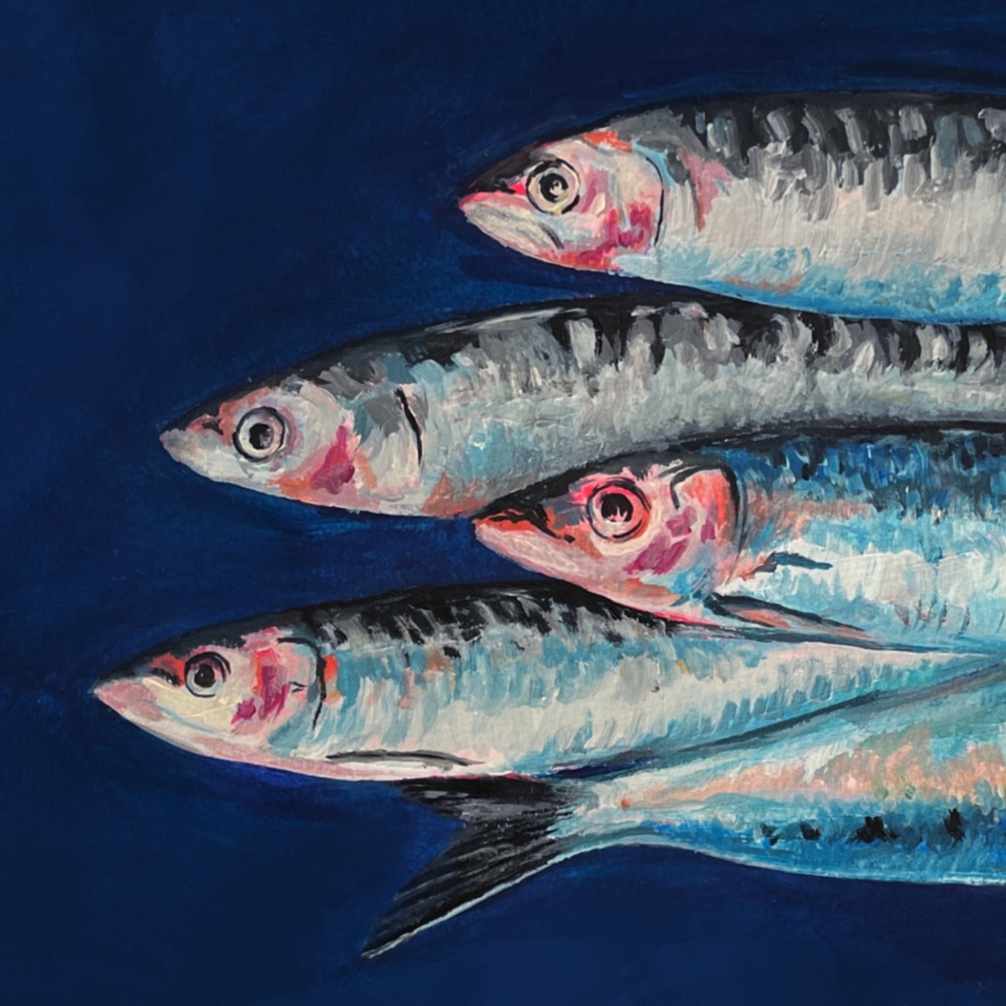Artistic depiction of four fish on a dark blue background