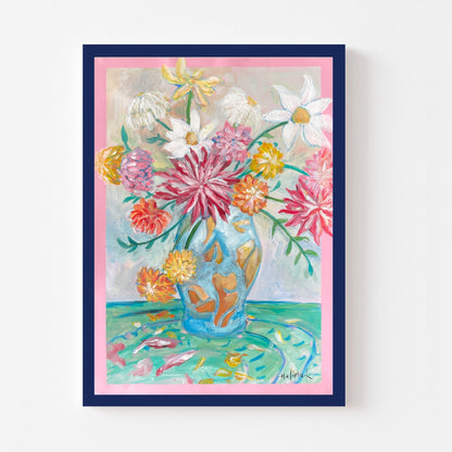 Framed painting of a colorful floral arrangement with a blue vase on a white background for living rooms and housewarming gifts