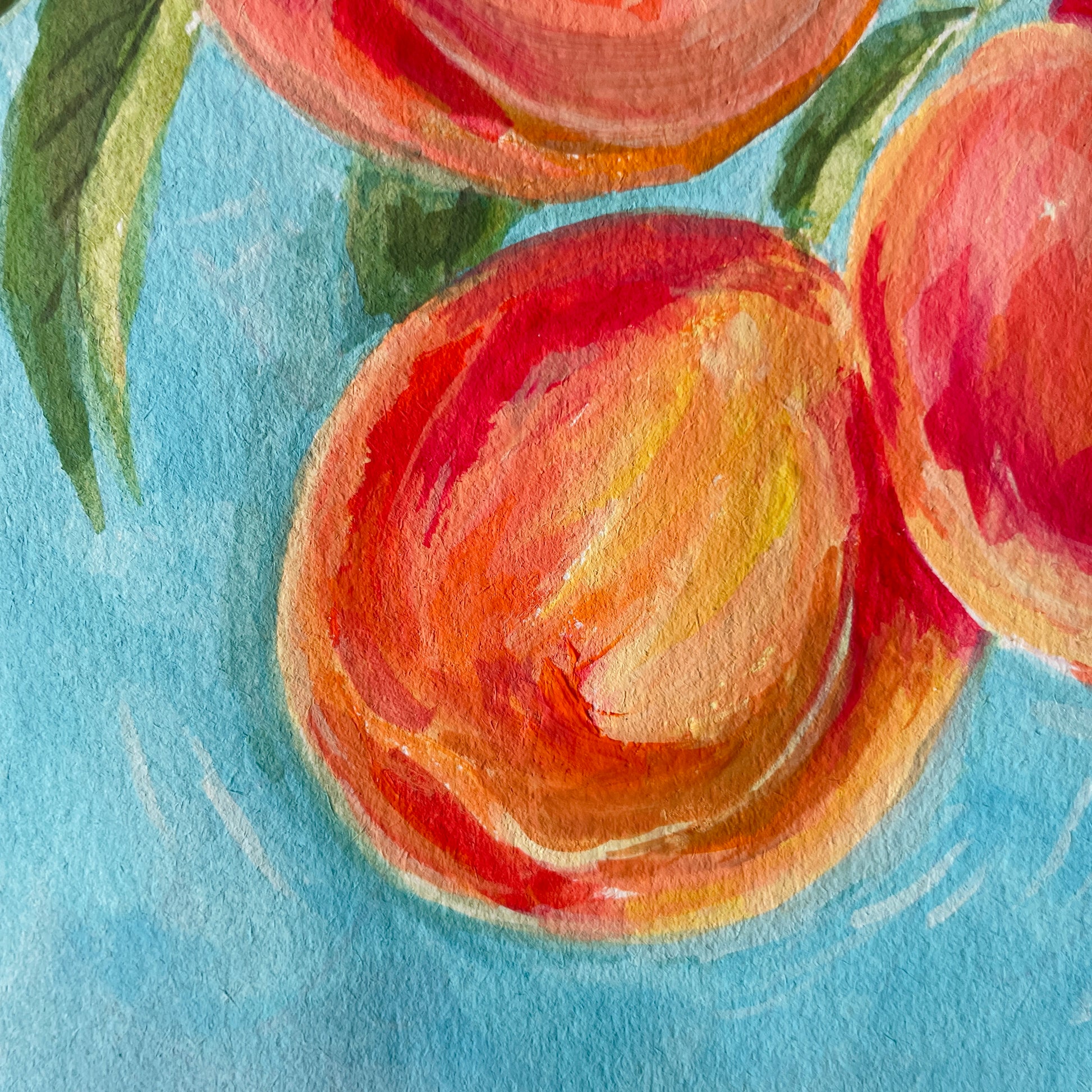 red, orang and yellow strokes visible on the close up of a peach painting done in gouache watercolour. 
