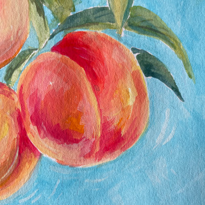 Painting of peaches with green leaves on a blue background