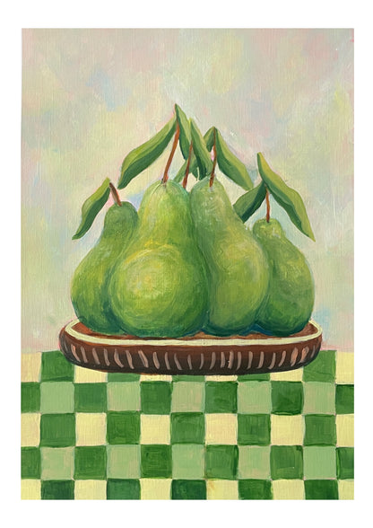 original acrylic food painting of green pear fruits on a wooden plate with a checkered tablecloth by emerging artist halima khanum