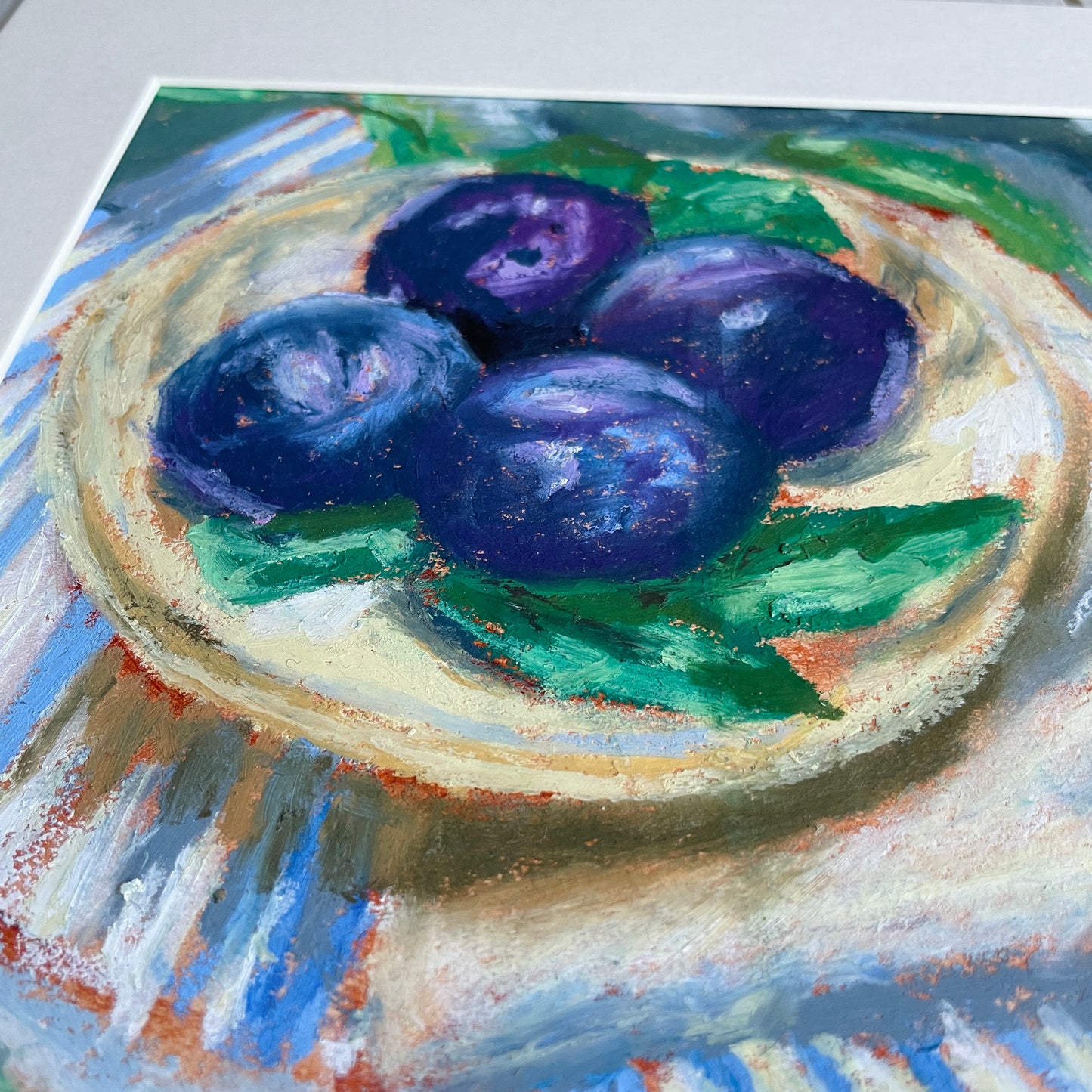 close up of textures on oil pastel fruit still life