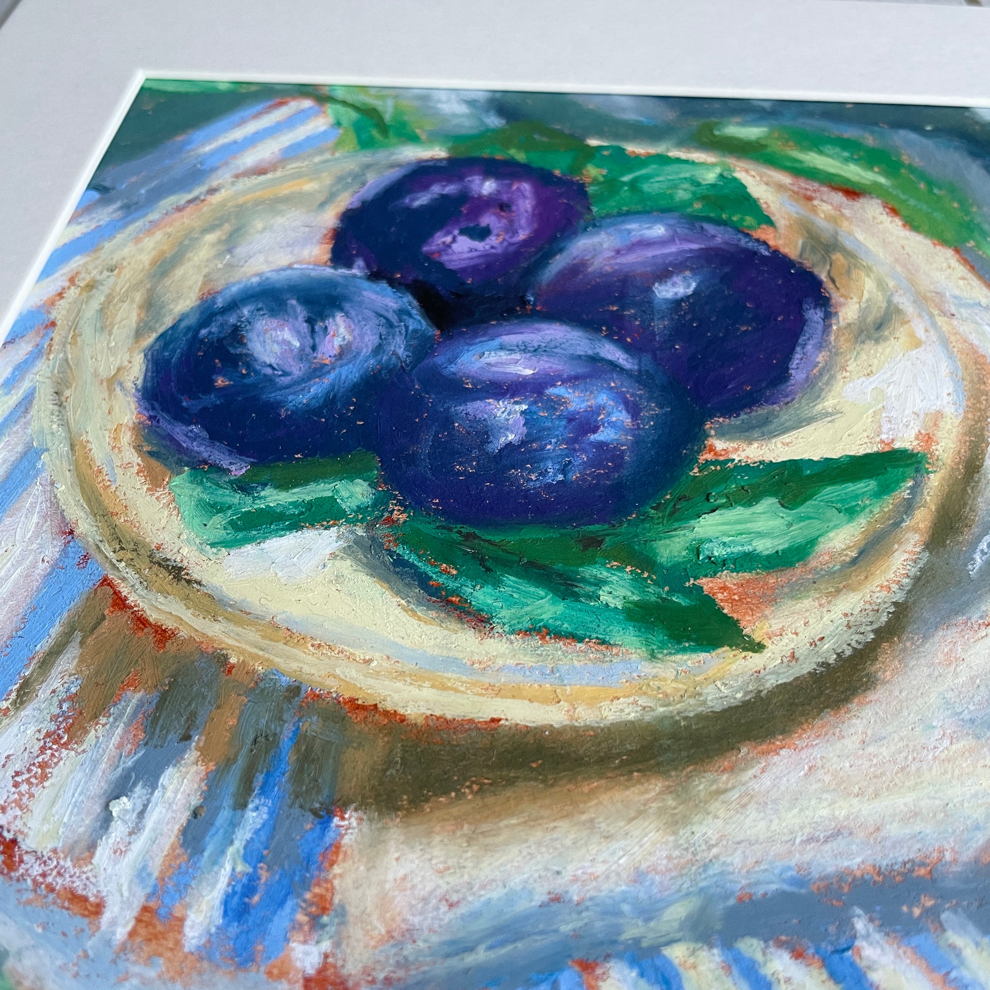 close up of textures on oil pastel fruit still life
