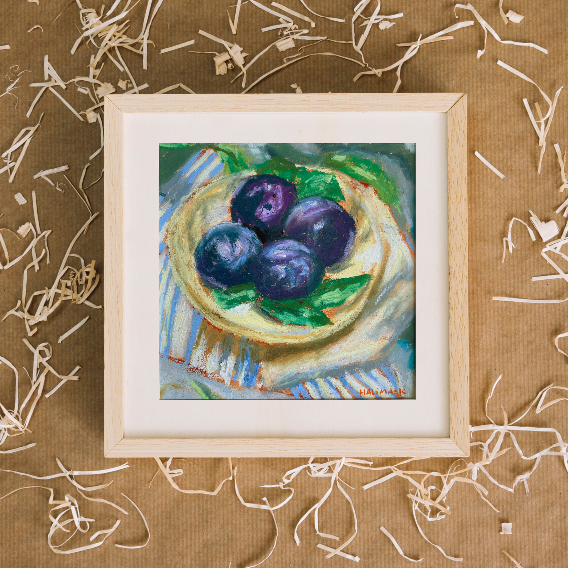 Framed textured, painting of plums on a kraft brown background