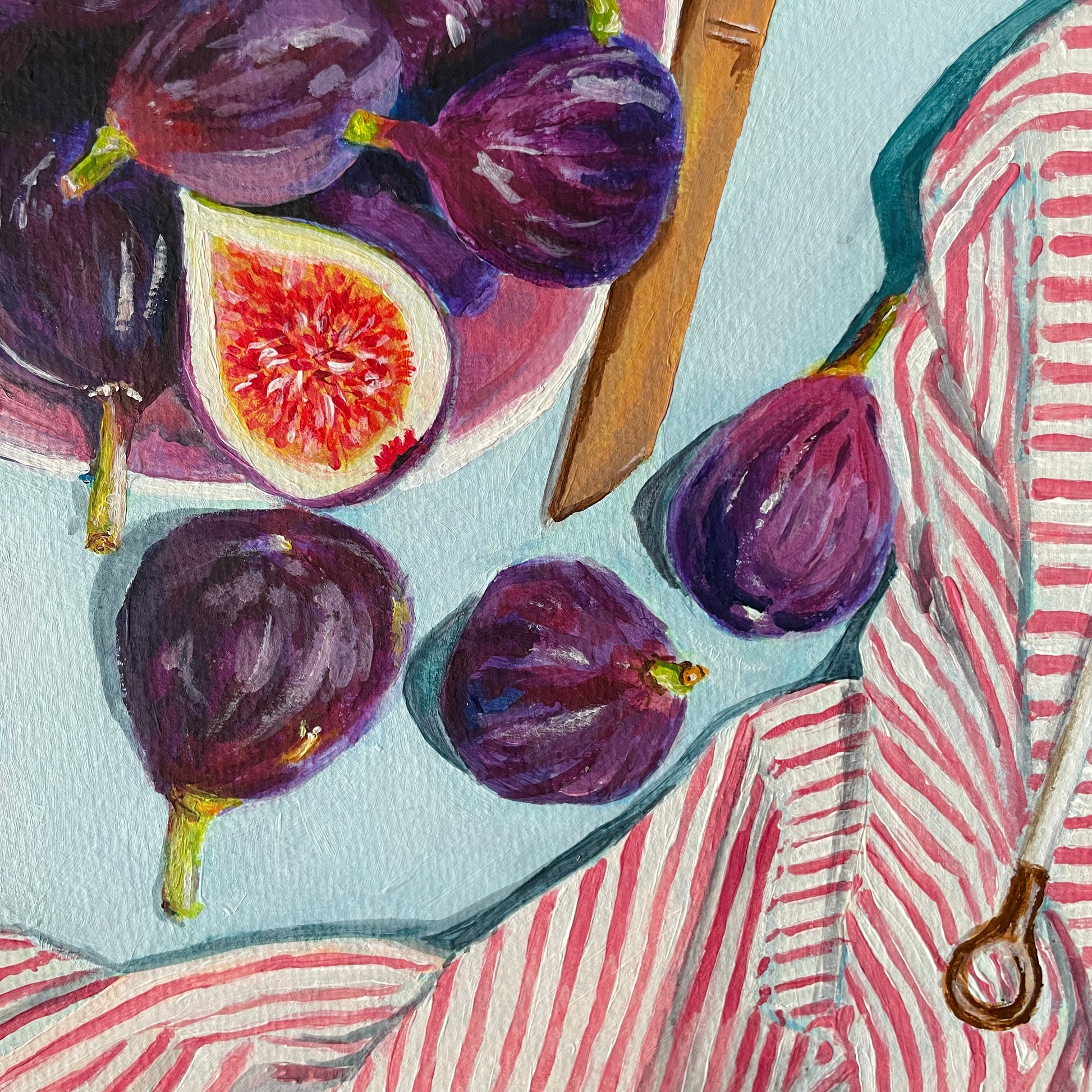 close up of fig fruit painting featuring fruits in a poink bowl with a striped pink tablecloth and knife handle